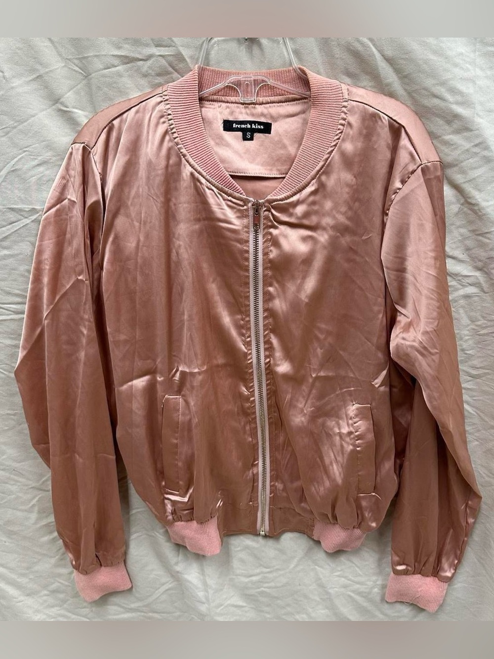 Shiny pink light jacket.